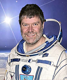 Greg is talking about living in space. He will also appear in his space suit
